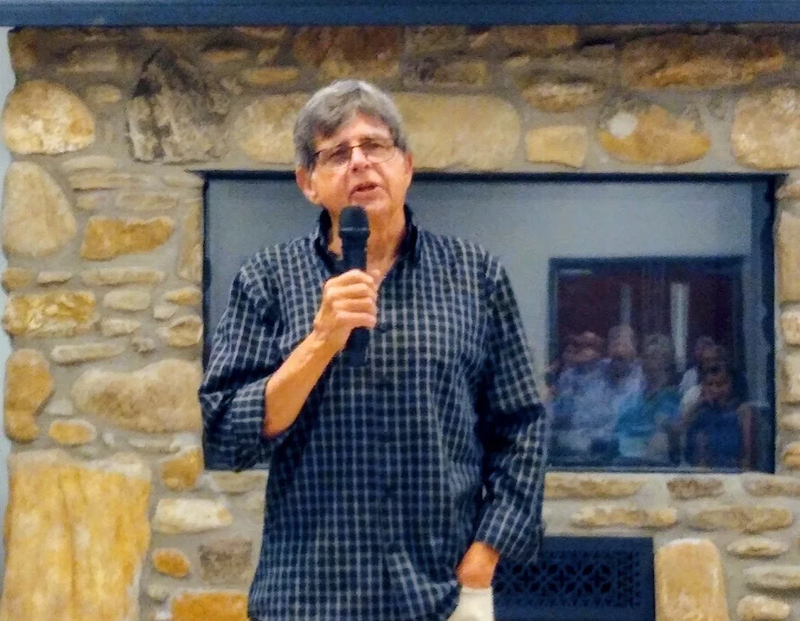 Chuck telling for webpage home page.jpg