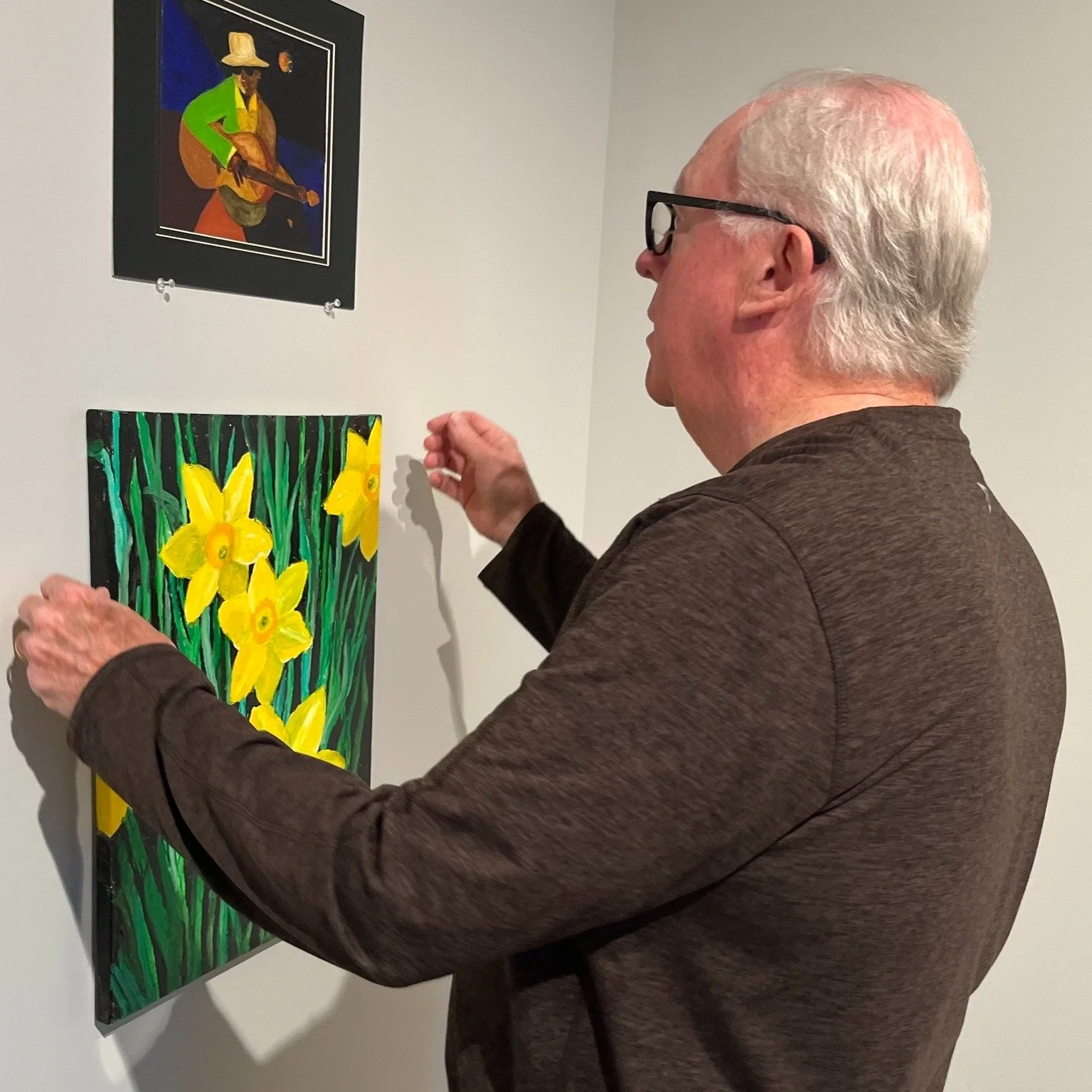 This week, Hutchinson Art Center staff members Emily Kohls and Rachel Hindle, and Board member Don Fullmer were busy getting members’ artwork up in the Main Gallery! 
Thank you to them for their hard work!
---
Join us tomorrow night from 5:00