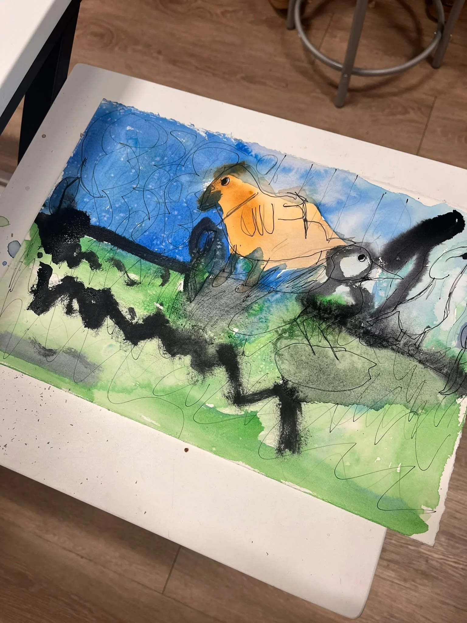 Here is some of our AMAZING art done at our March make-n-take art classes for kids!

This month, students created their very own watercolor painting of a colorful spring landscape with birds and developed their skills in line, shape, space, color, wa