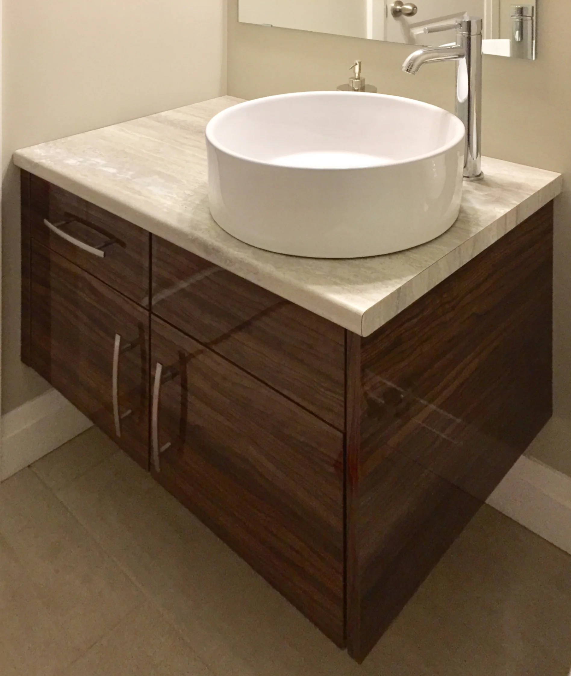 floating vanity with a vessel sink