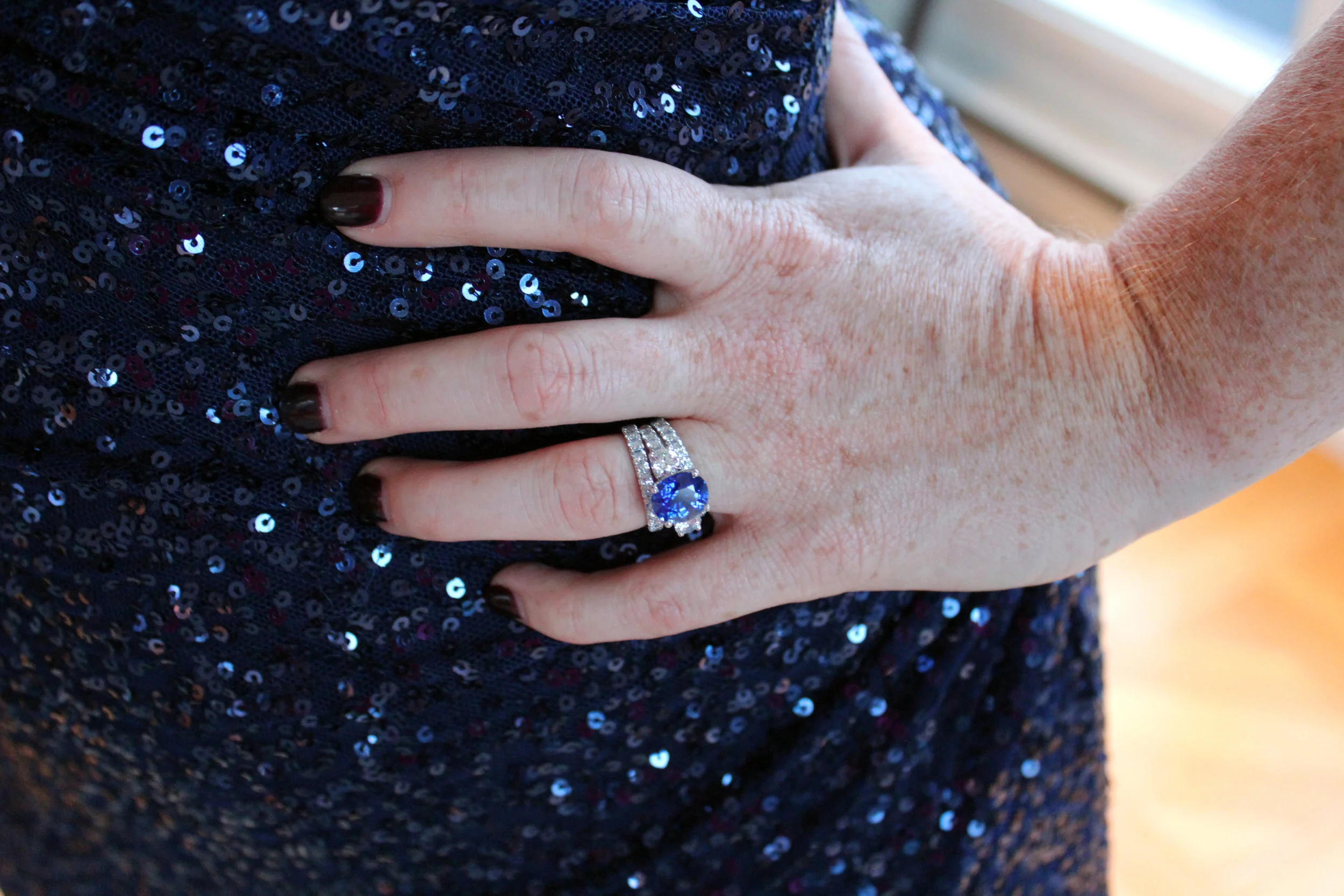 Custom sapphire and lab diamond engagement ring in platinum with lab diamond eternity band in platinum