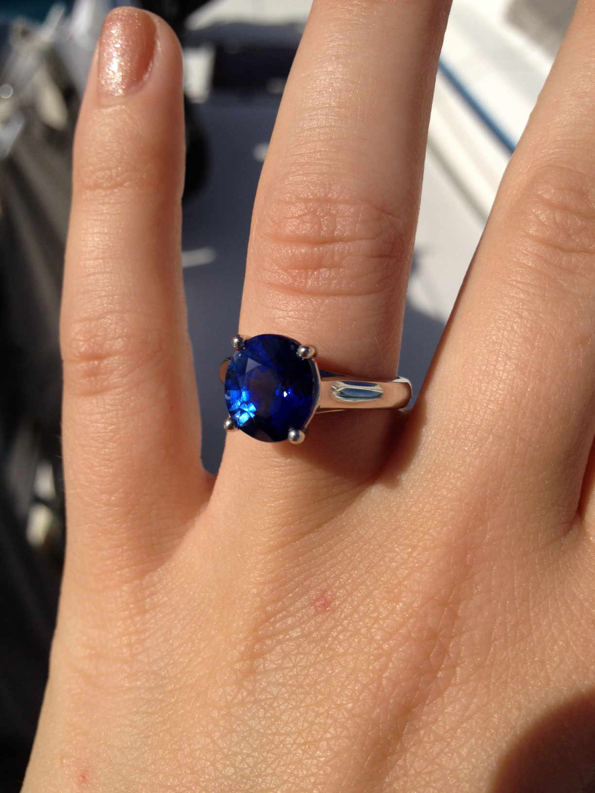 Dark blue sapphire engagement ring
