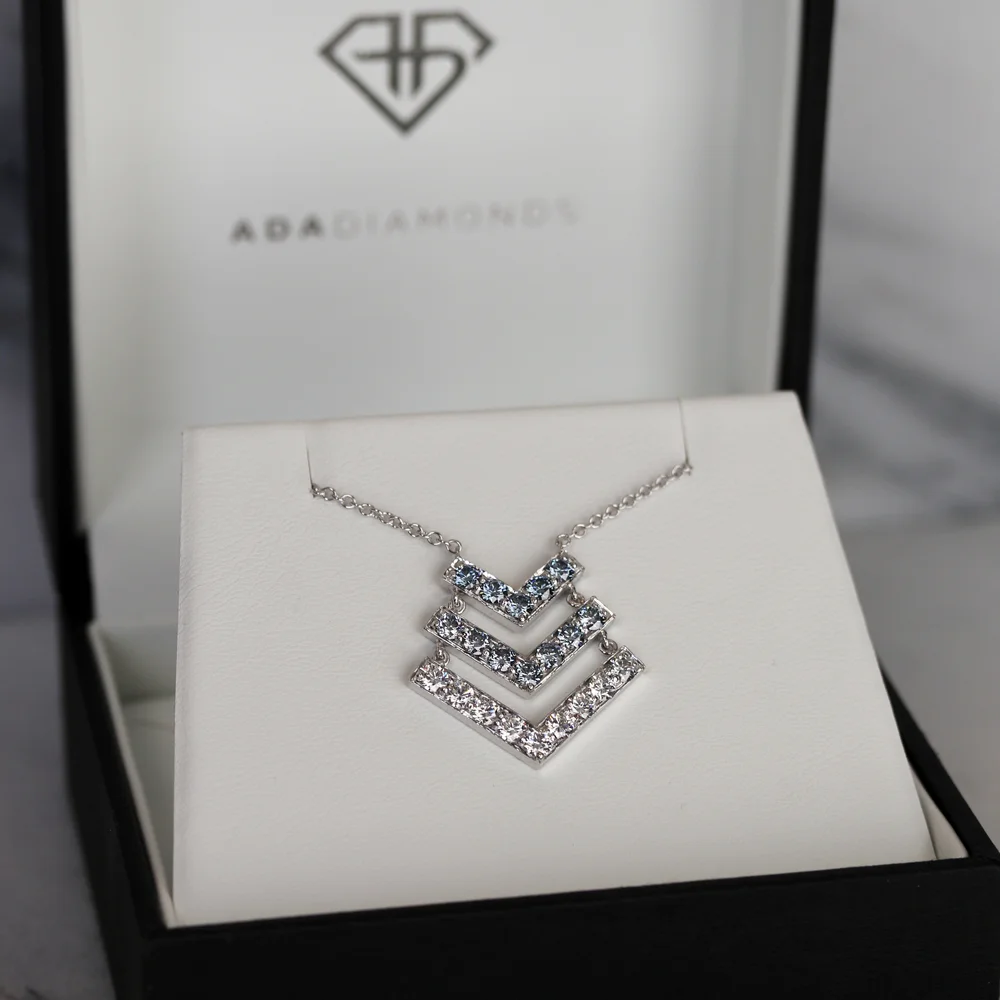 RAINBOW OF BRILLIANCE A new era of fancy colored diamonds 