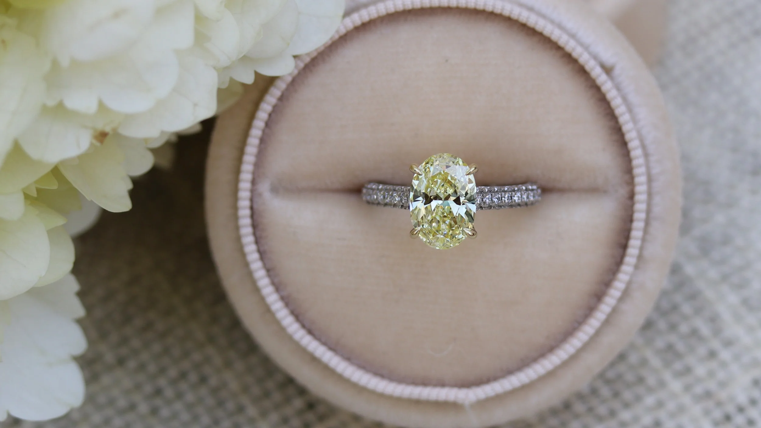 fancy yellow oval lab created diamond engagement ring with pave set diamond band Ada Diamonds