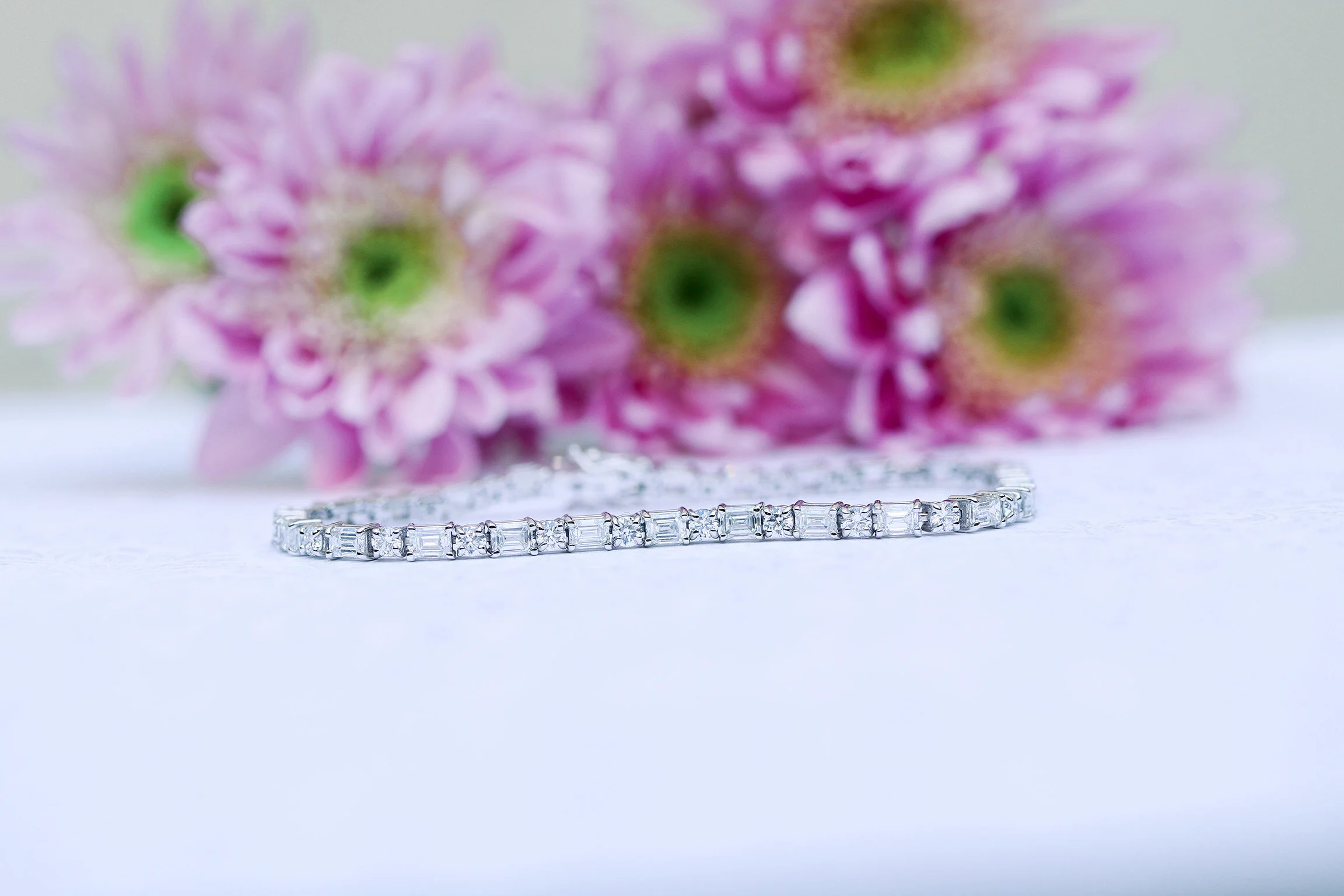 lab-diamond-tennis-bracelet-with-emerald-cuts.jpg