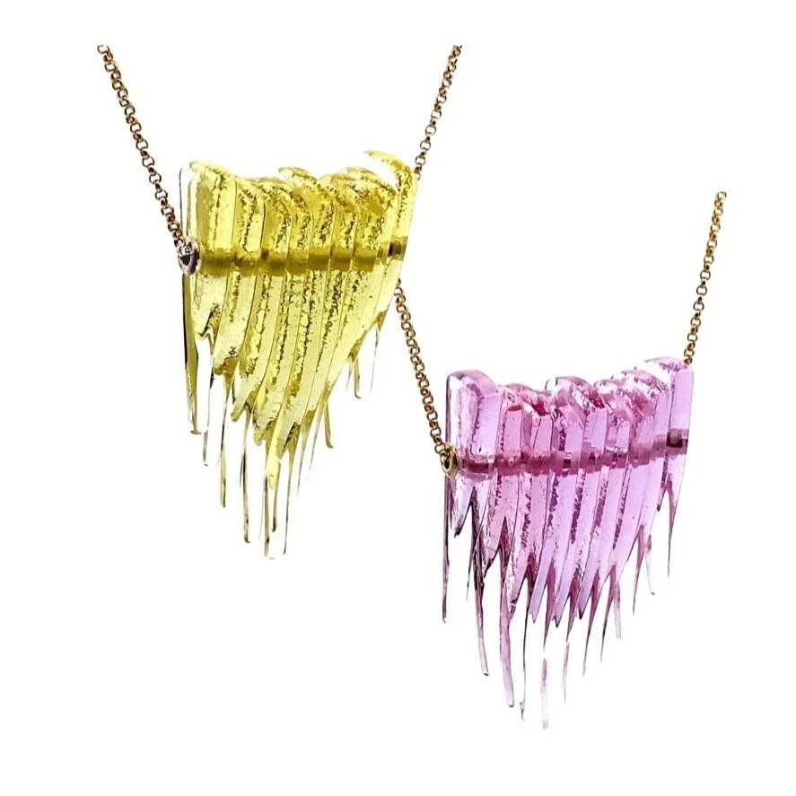 From caution — to crowd favorite: Mini Kinetic Shield Necklace