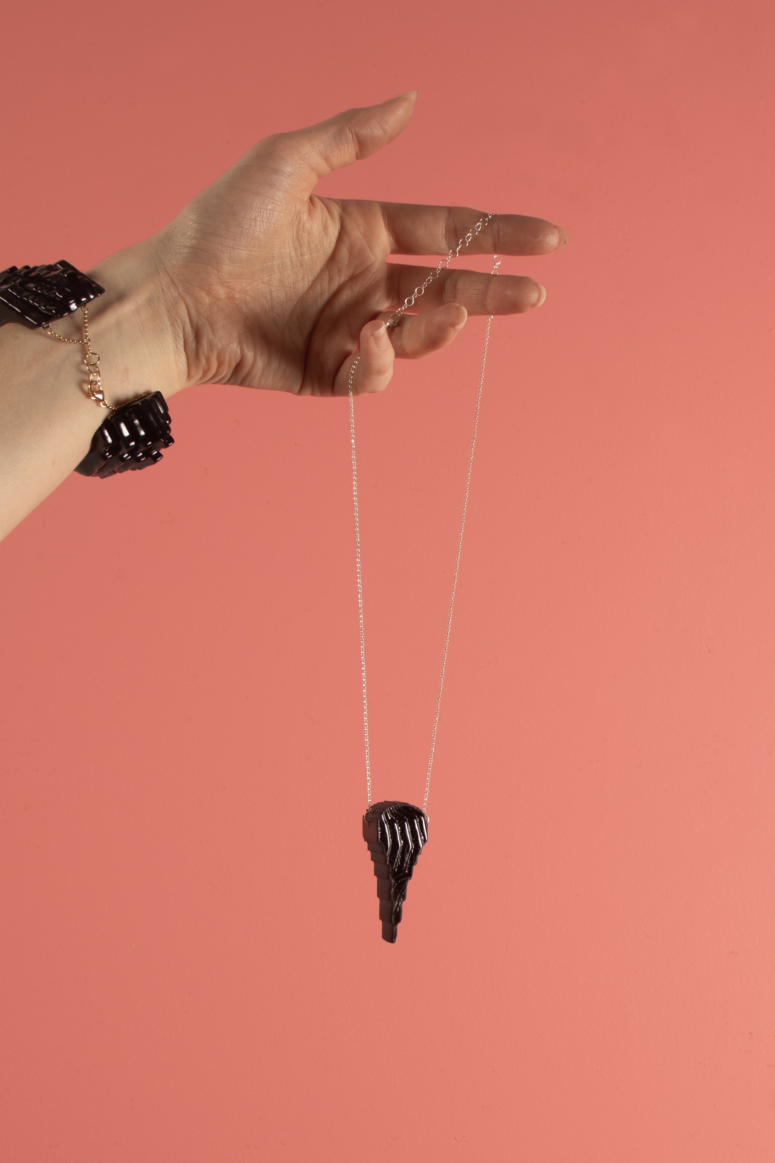 PendantTextureDecoDaggerinBlack_onpink.jpg