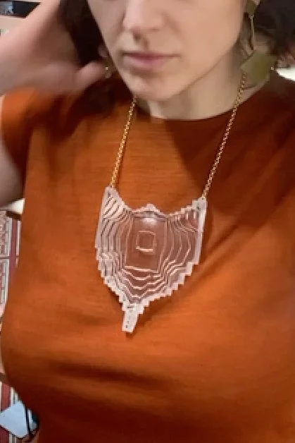 LargeBustShieldinClear_angle_onbody.jpg