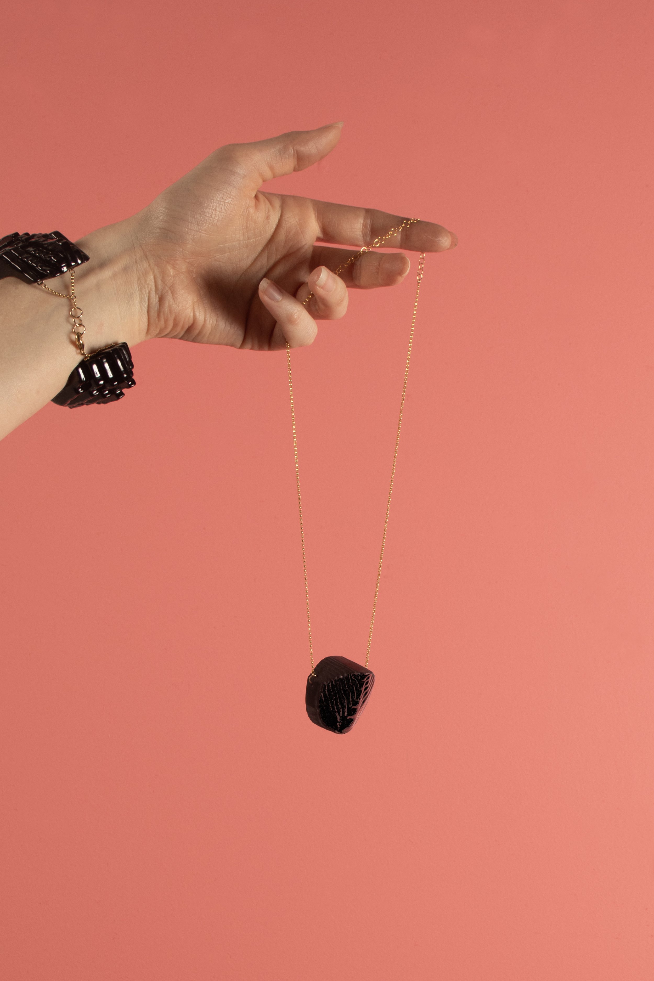 CufffminiEllipseinBlack_onpink.jpg