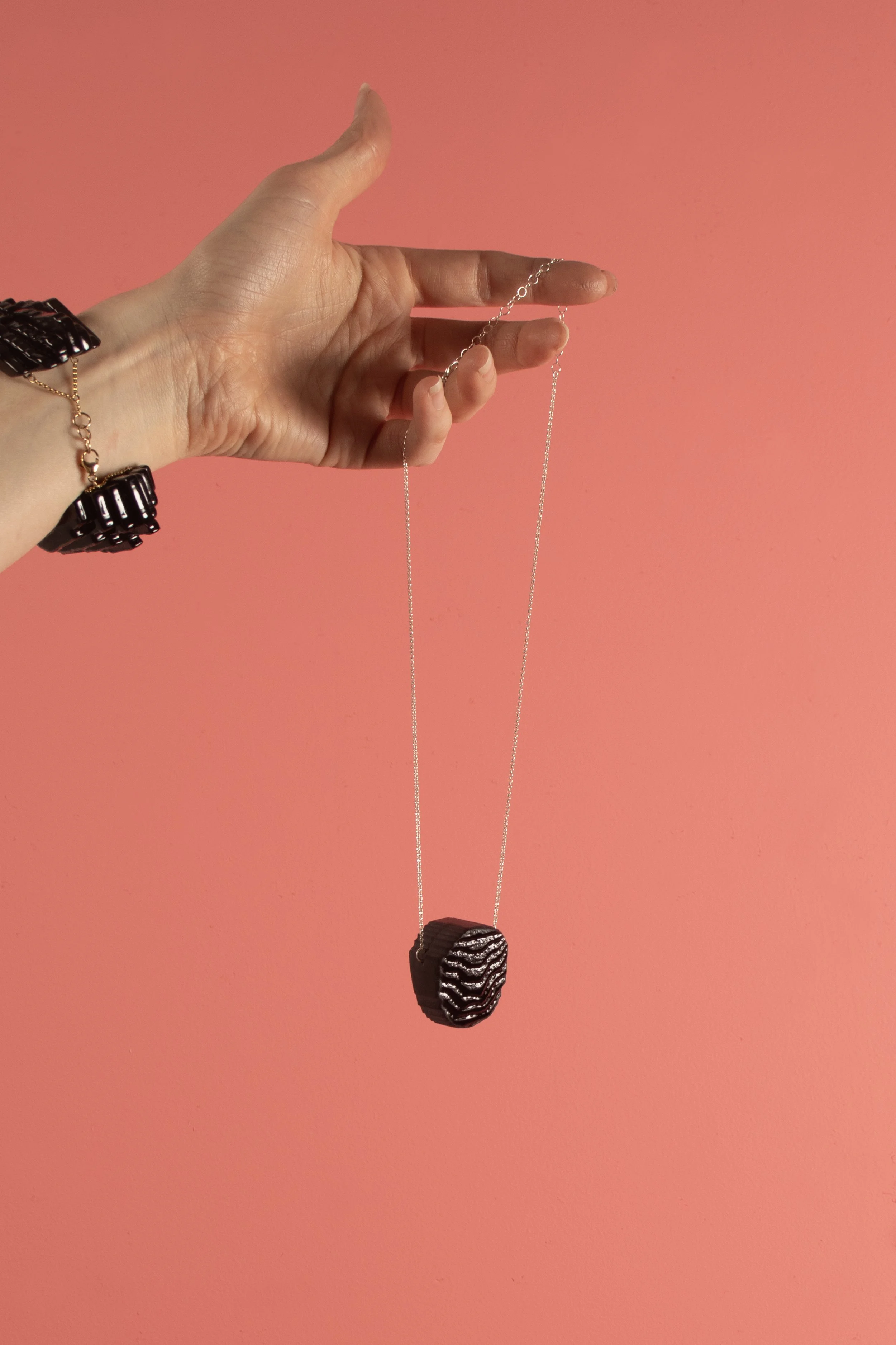 PendantTextureMiniEllipseinBlack_onpinbk.jpg
