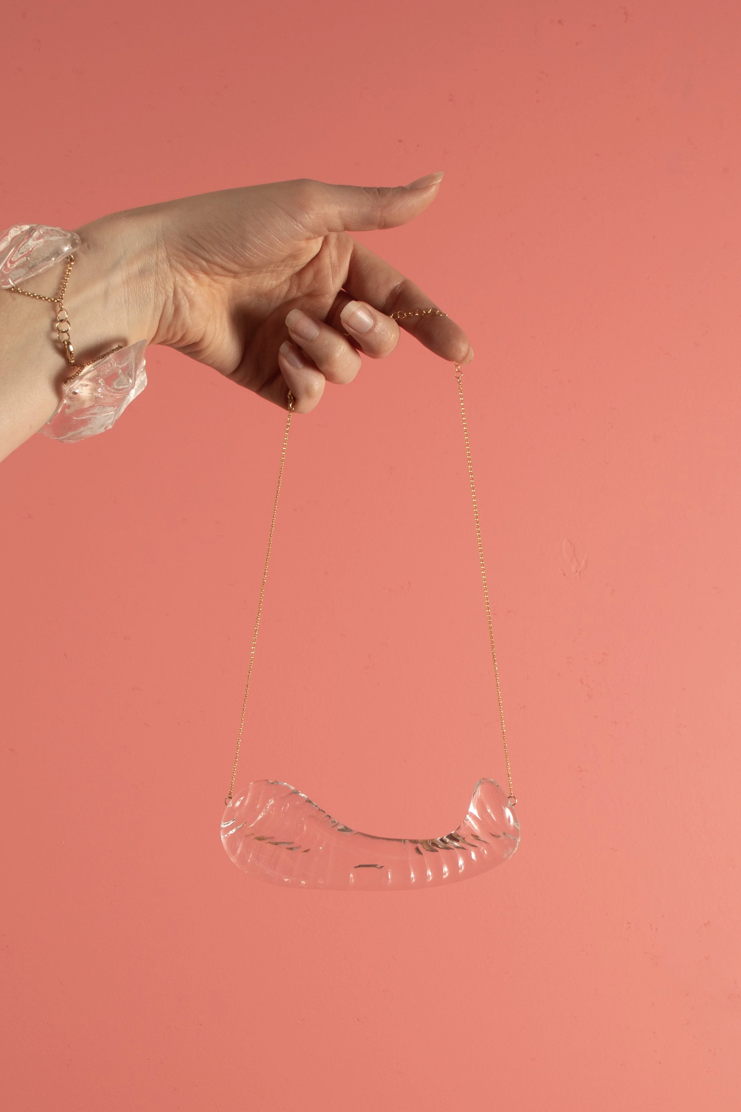 ClearBustSwoosh_pinkbackdrop.jpg