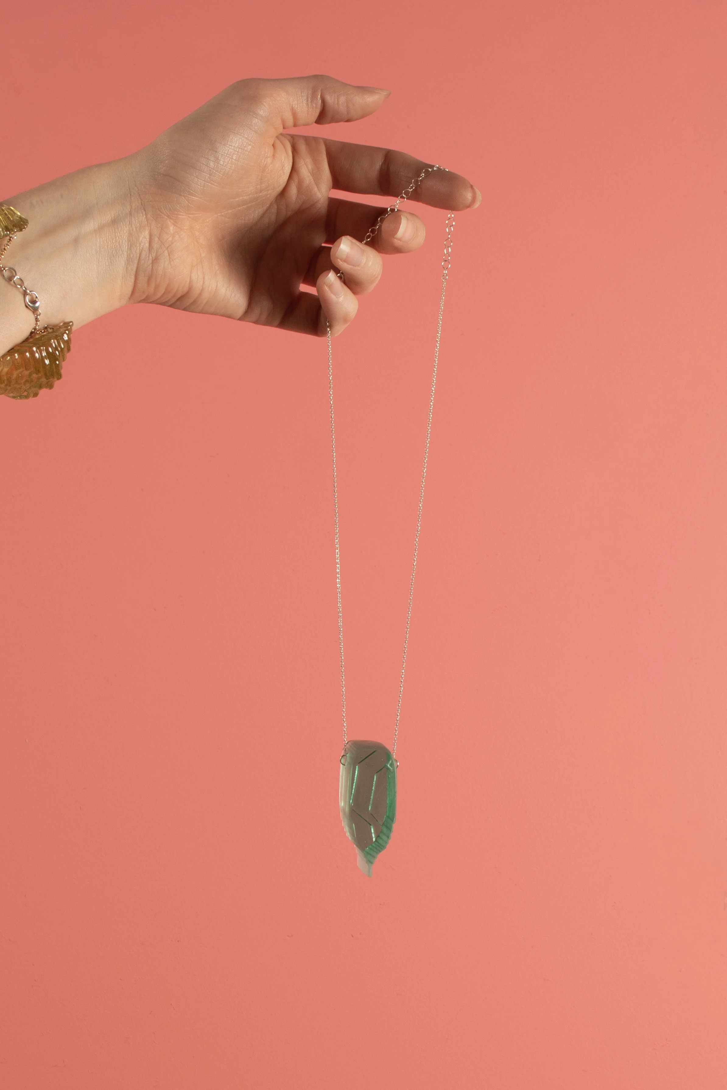 ElongatedRoundedShieldinJade_smooth_onpink.jpg
