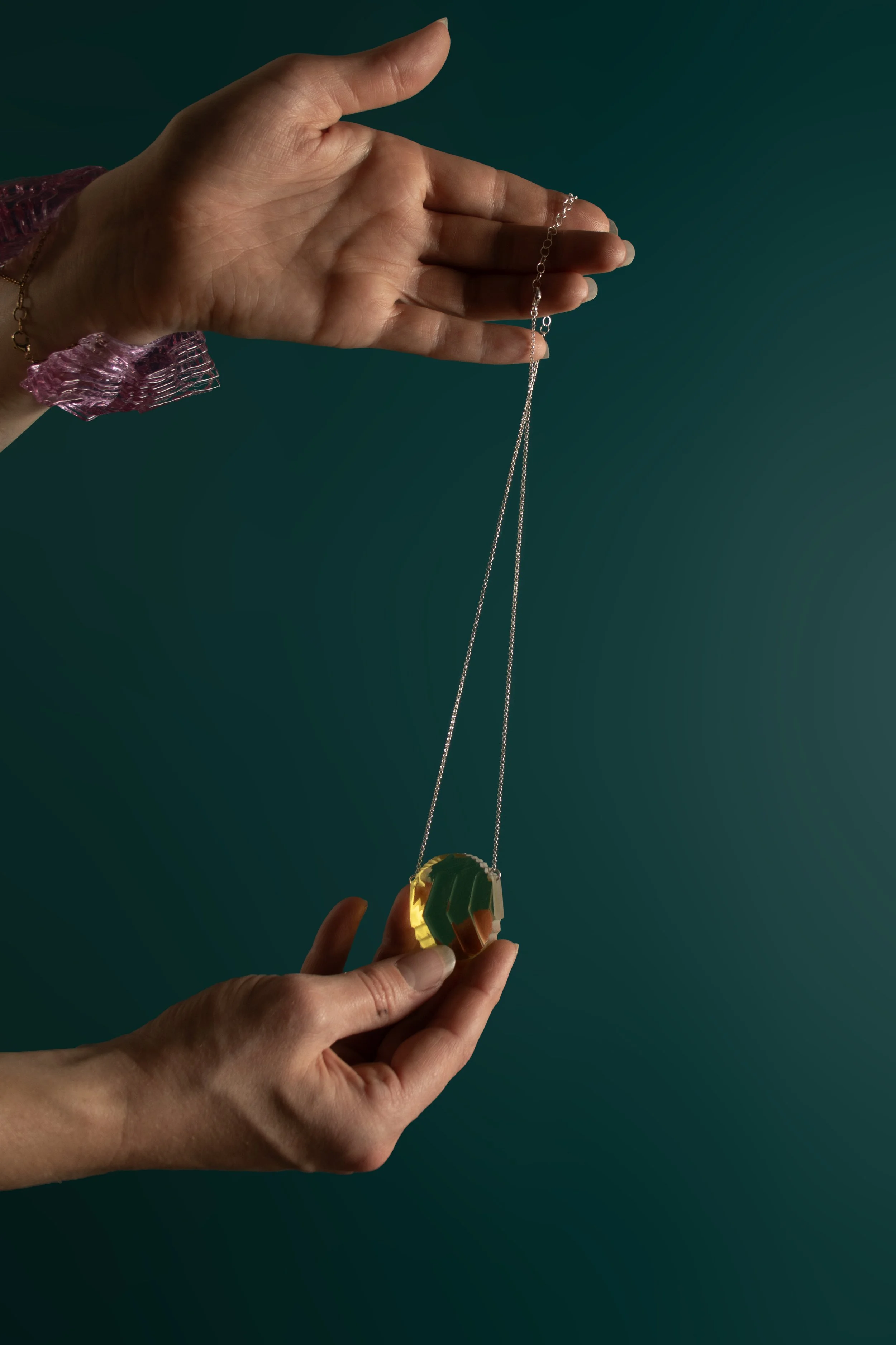MiniGTTEllipse_back_onteal.jpg