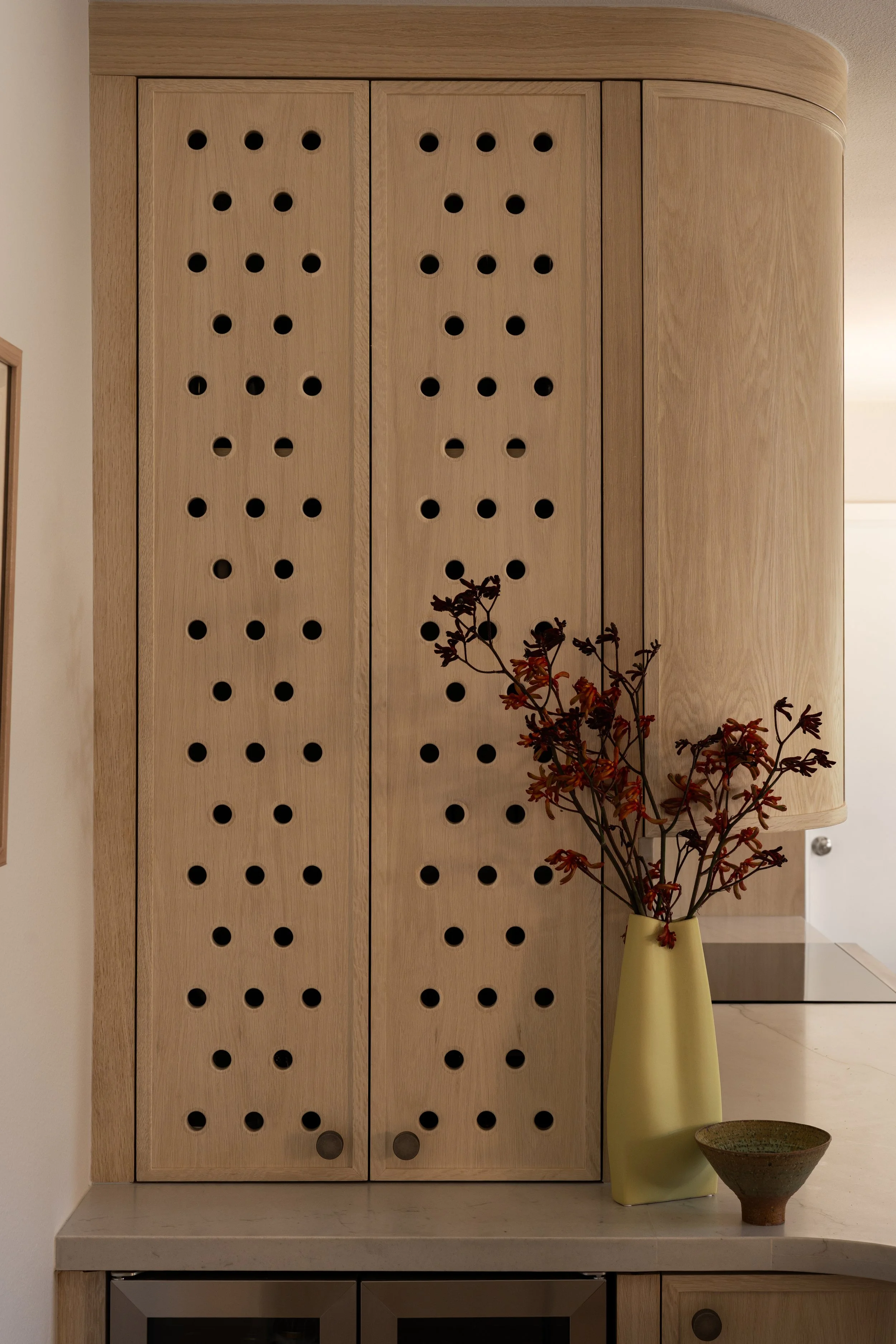 slotted wholes in cabinets. mid century modern kitchen cabinets