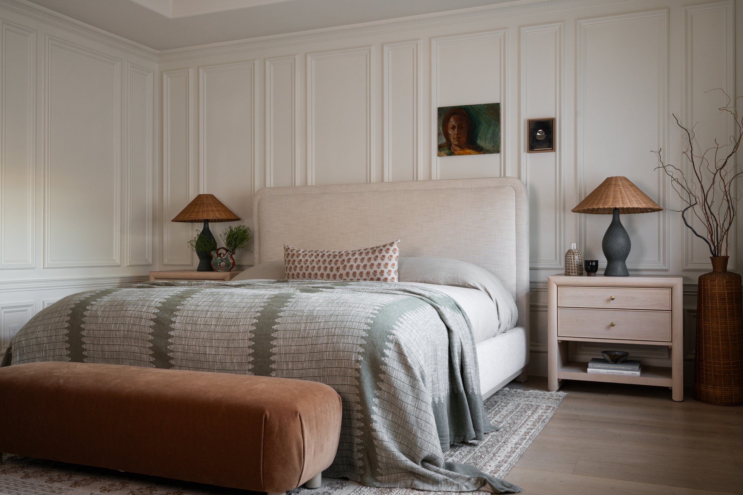 primary bedroom design of organic modern style, with wainscotting walls.