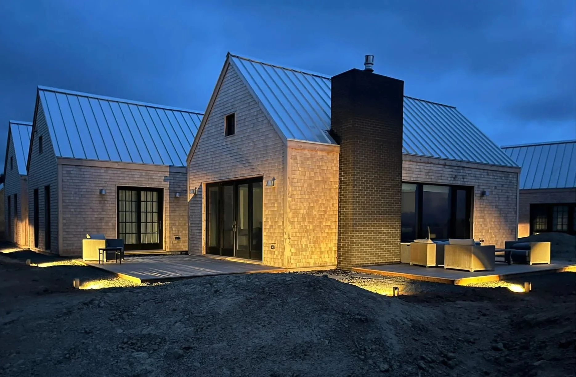 Ace fixtures by InLite were placed around the hardscape after hardscape was installed but before final landscping so that all the wires could be buried. 