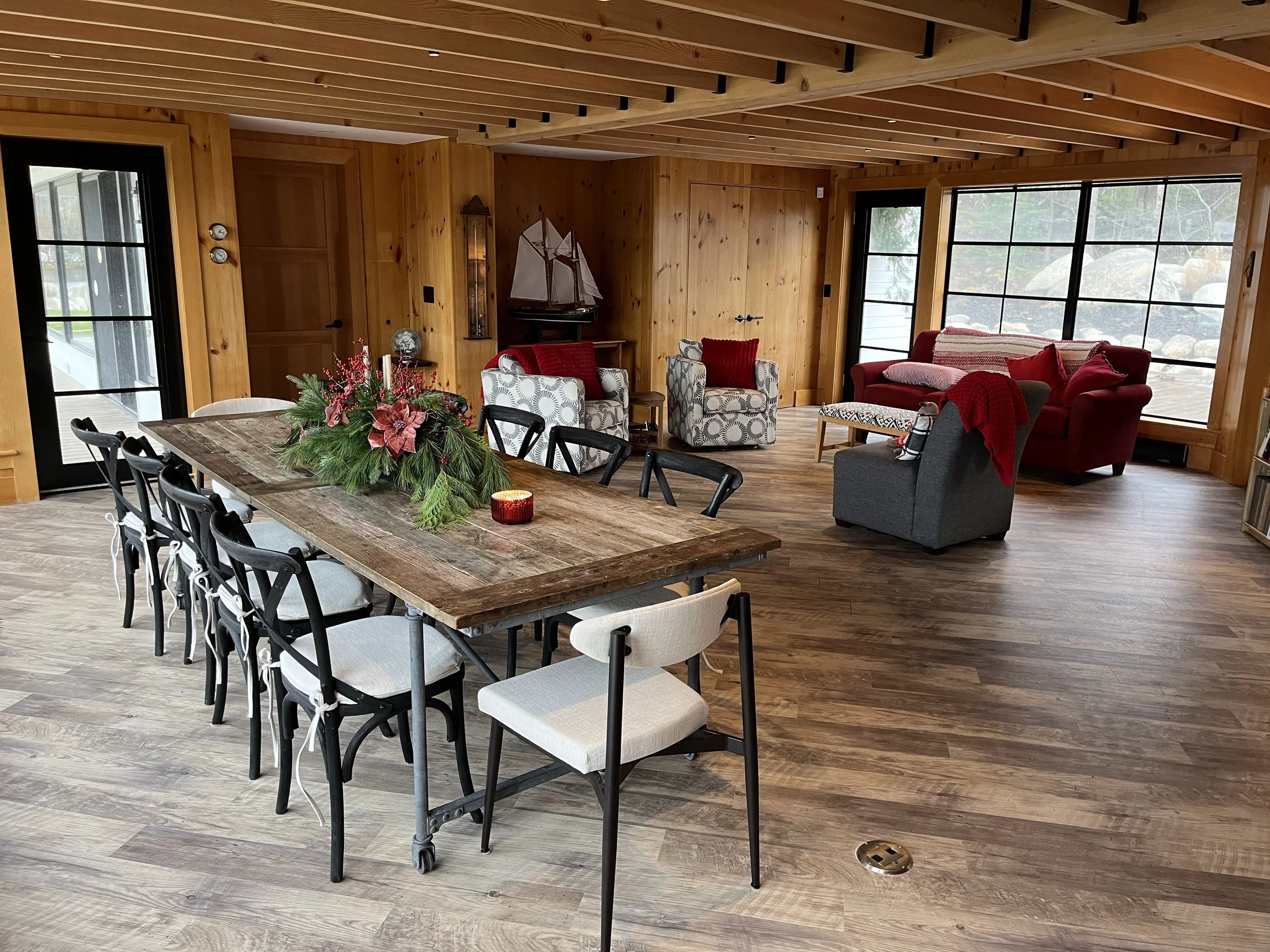 Christmas '25 decorating included rearranging furniture to open up the grand room for dining & cocktails.