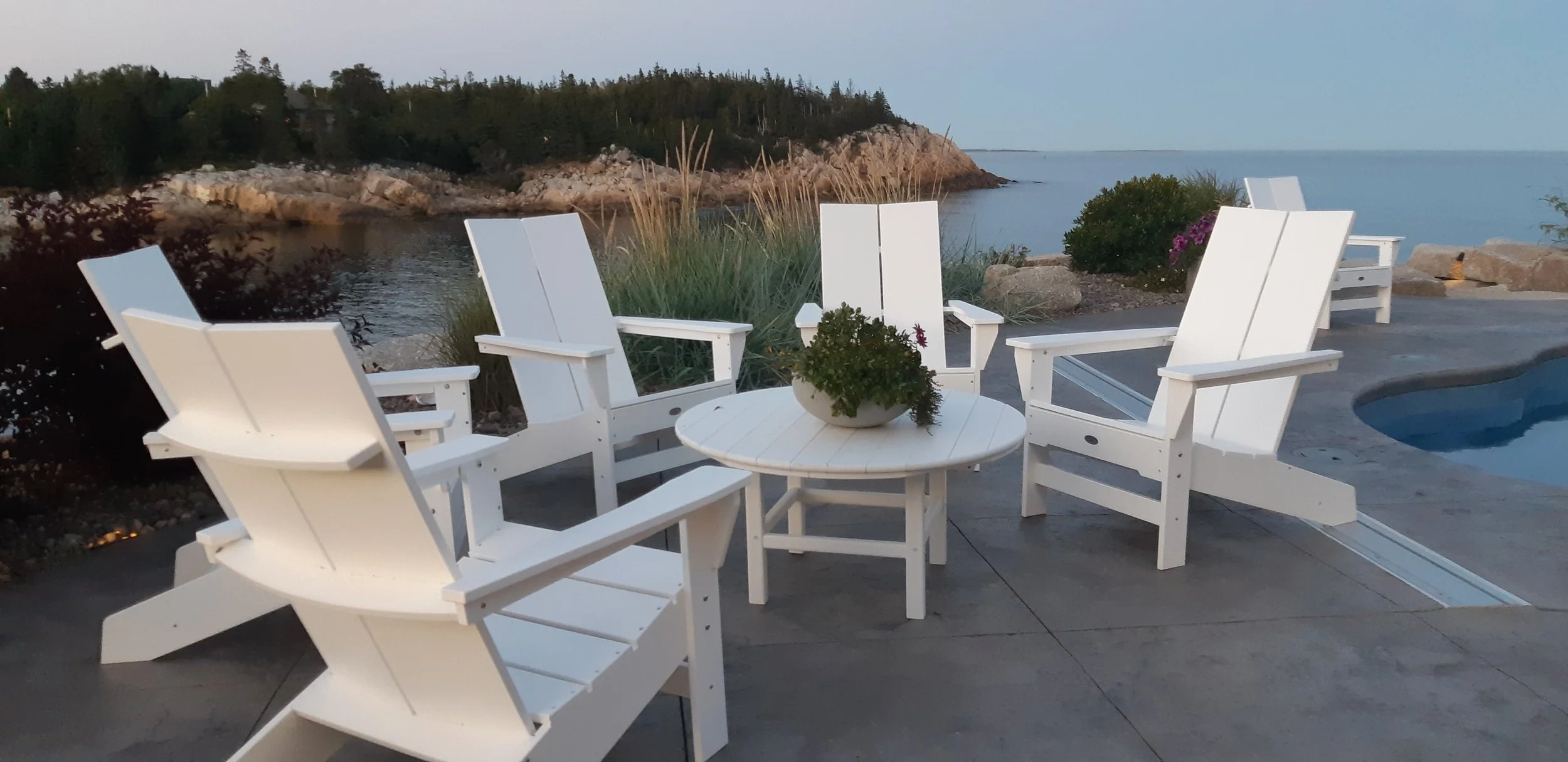 The glow of twighlight is a perfect time for landscape lighting to define borders and create enclosure for intimate spaces.