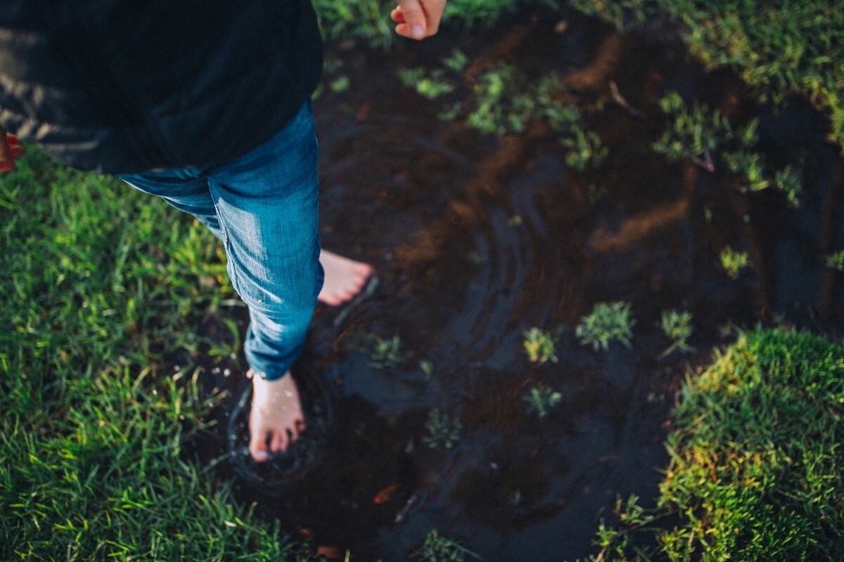 Child barefoot in the mud - Emily Chalk Photographer.jpg