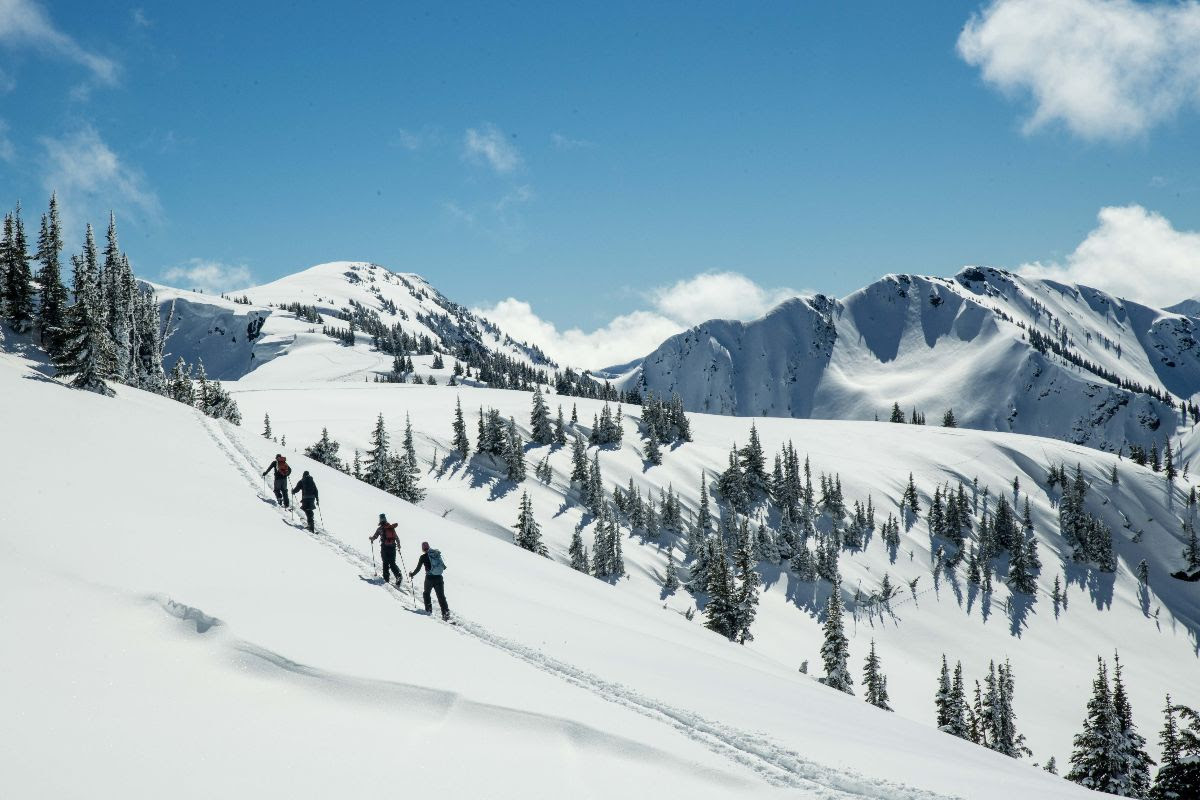 Everyone knows skiing & snowboarding is better when you earn your turns