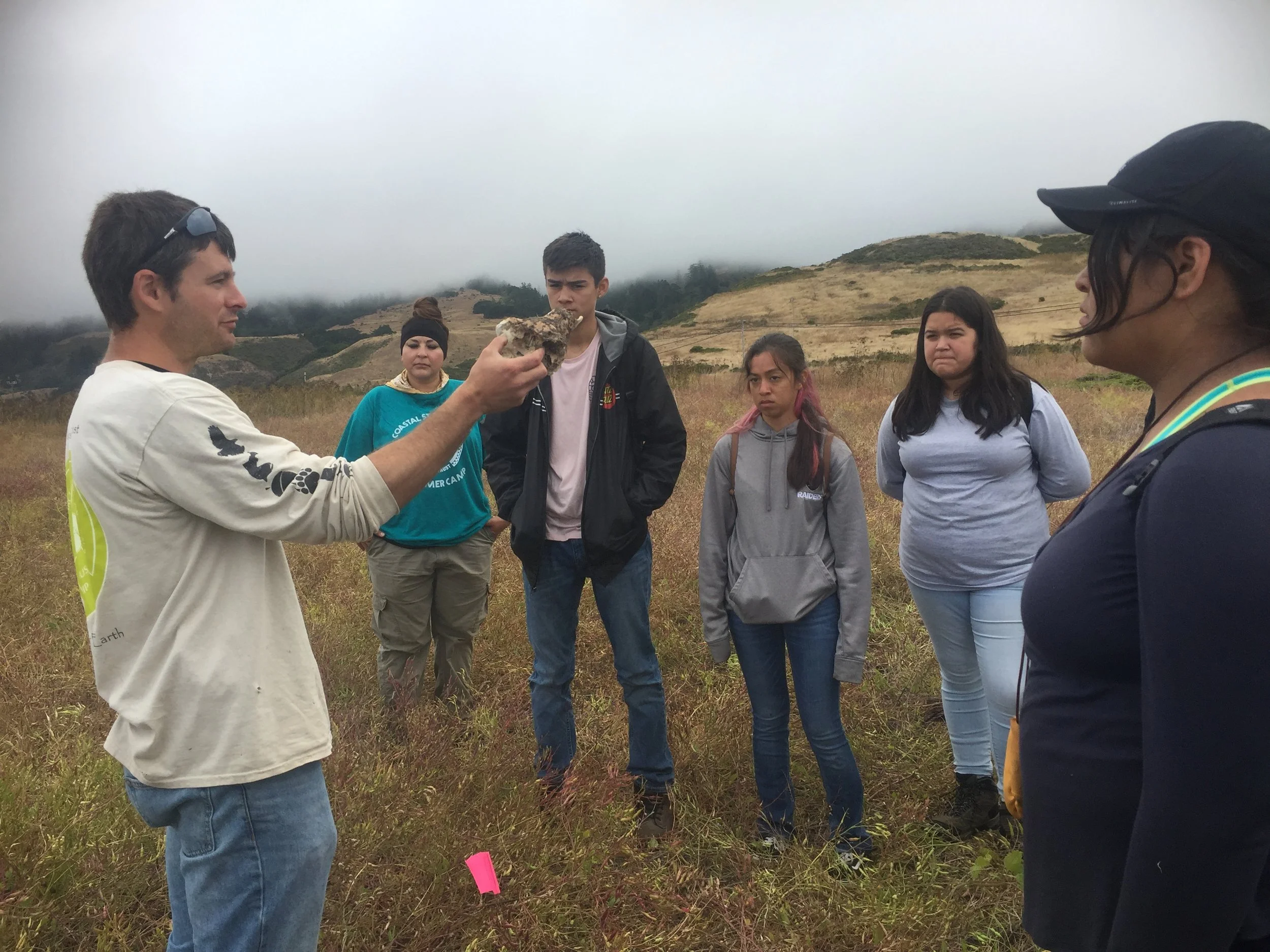 Rob Cuthrell, AMLT Research Associate, sharing archeological research knowledge with NSC interns