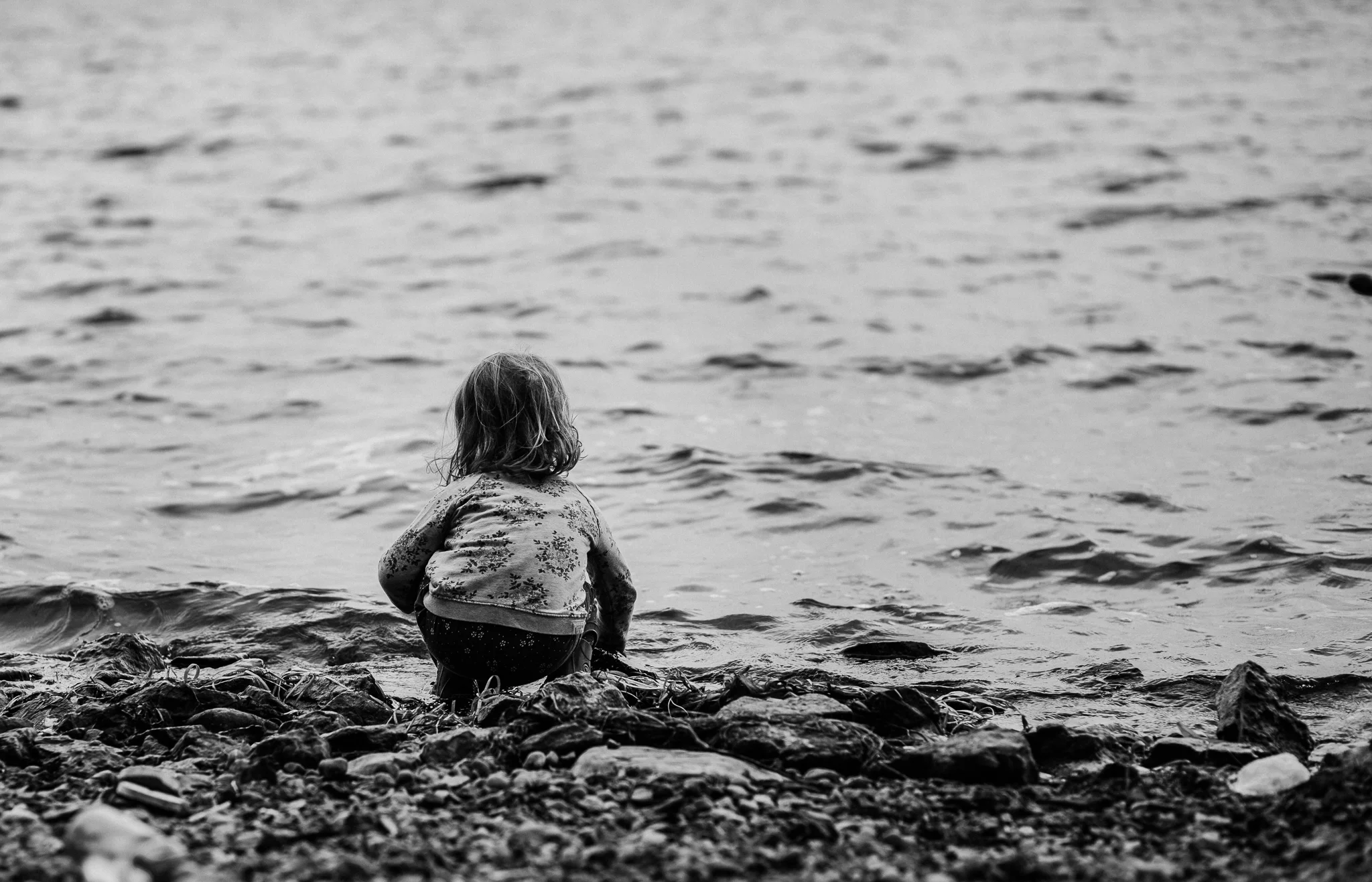 child by water