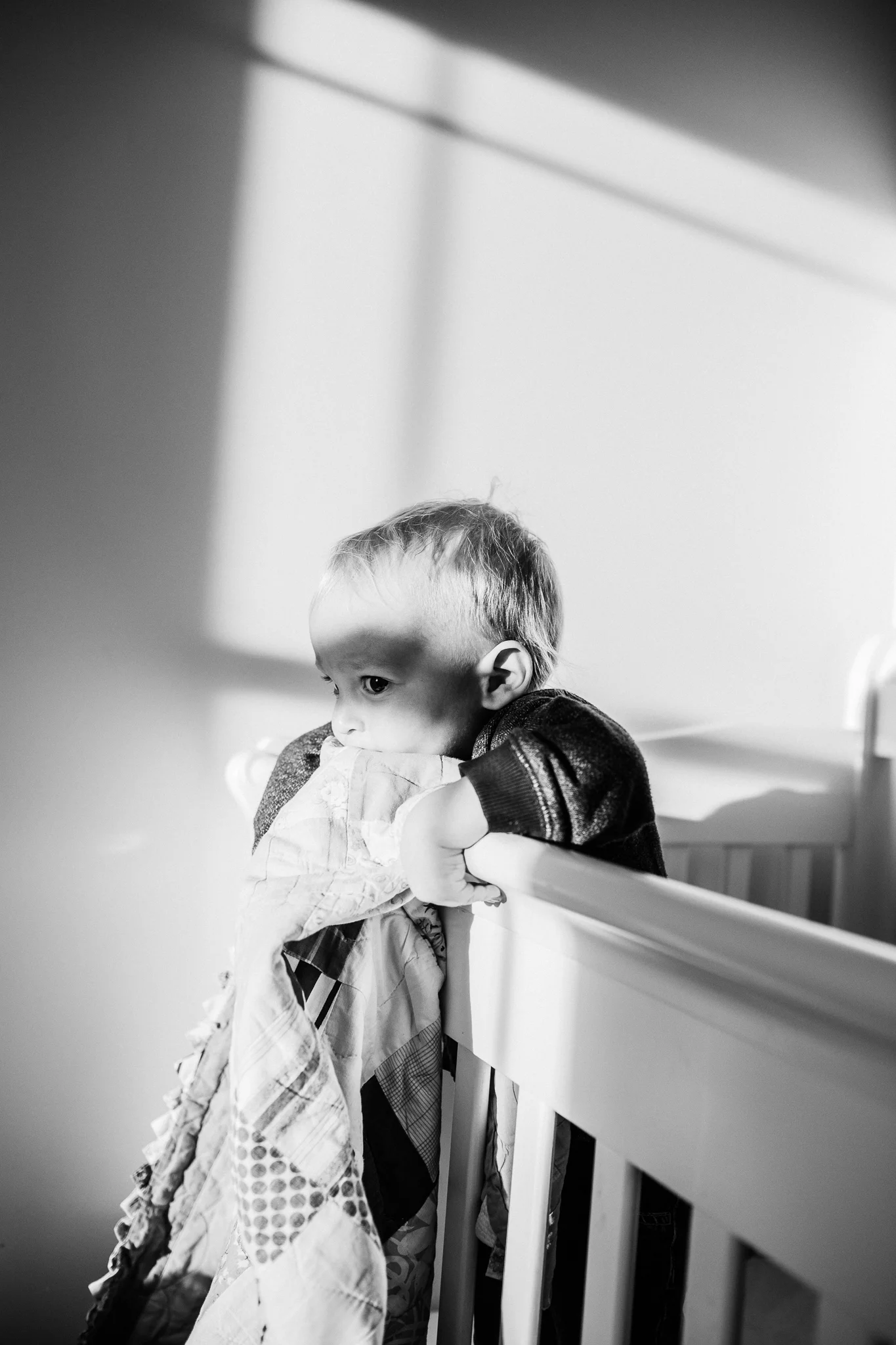 toddler in crib