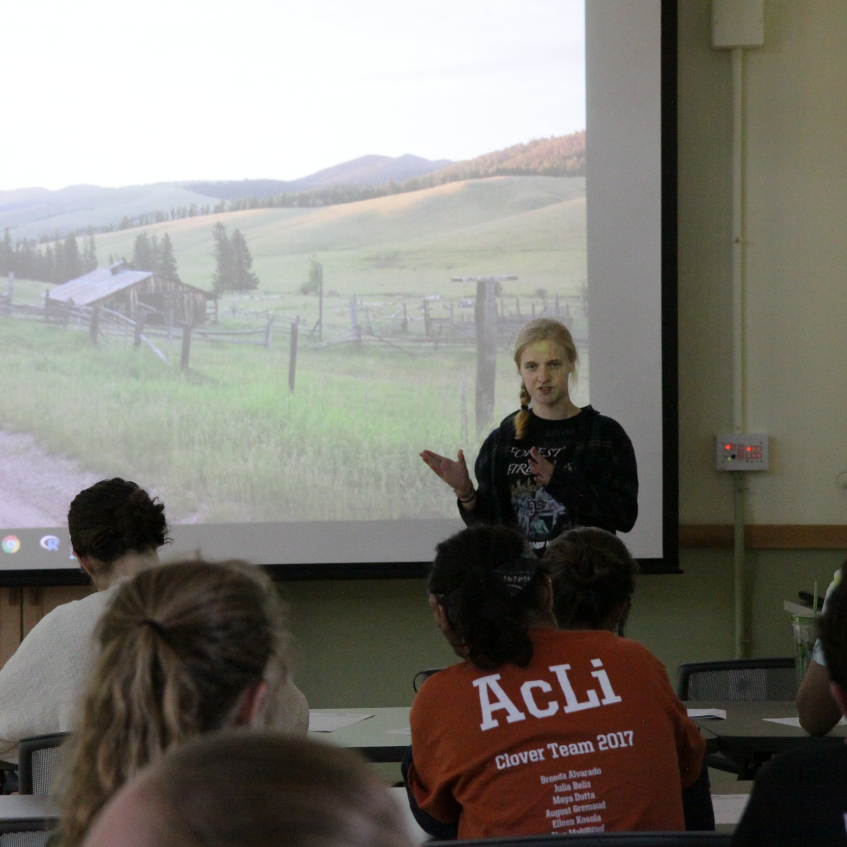 Emma presenting to the Tyson community at the end of the summer