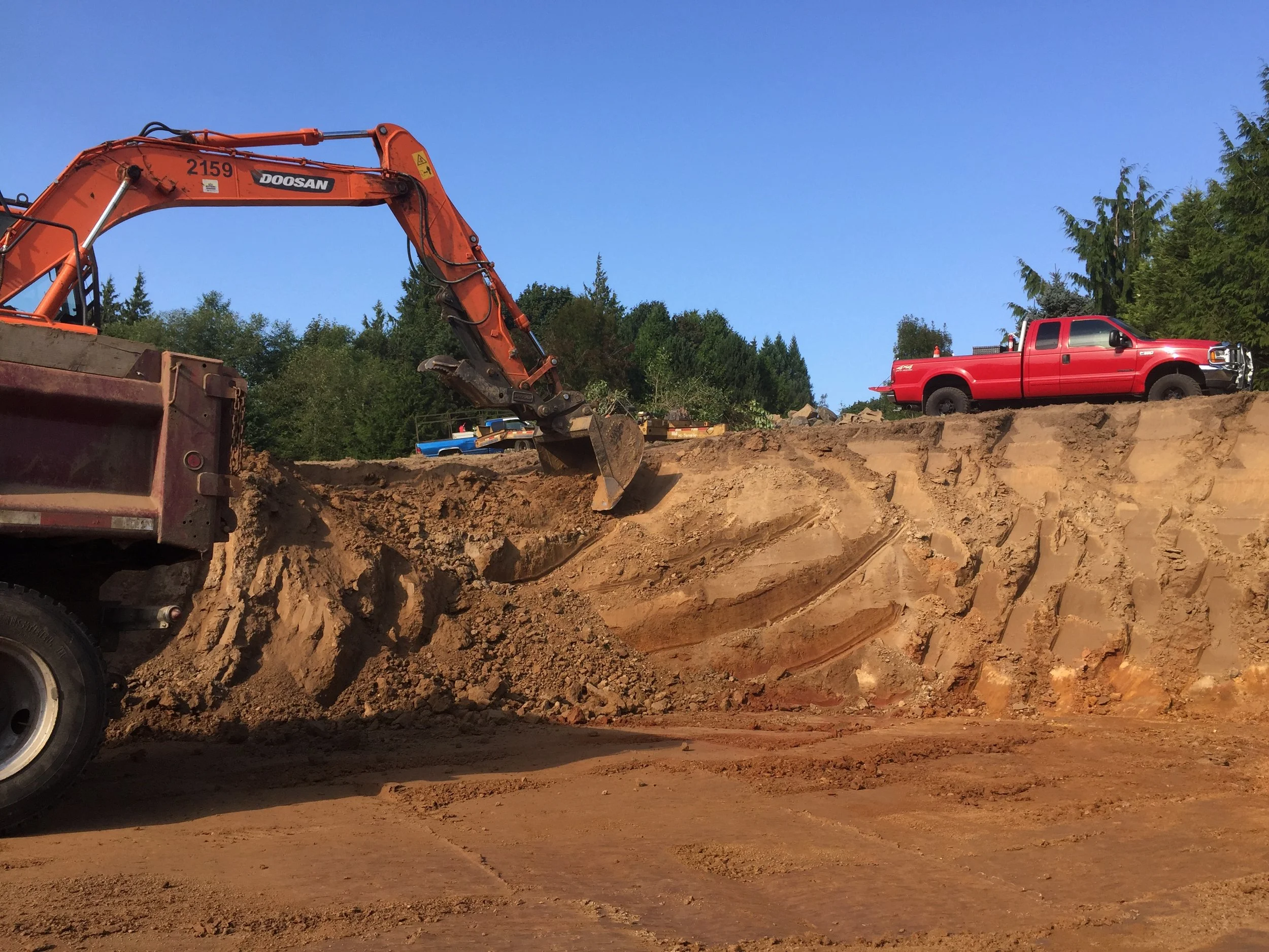 Excavation equipment on a Cowlitz County job site
