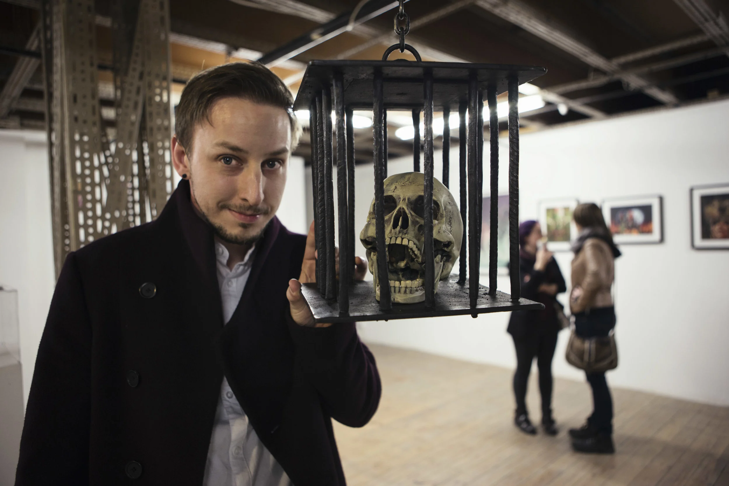 Luke Axworthy with his Screaming Skull in the HERETICS exhibiton - Photo by Kirsty Garland.jpg
