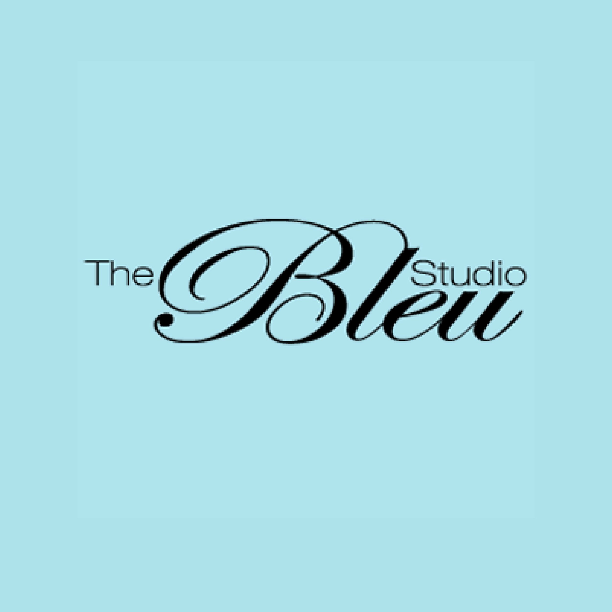 Close-up of a logo with stylized black cursive text on a light blue background, partially visible.