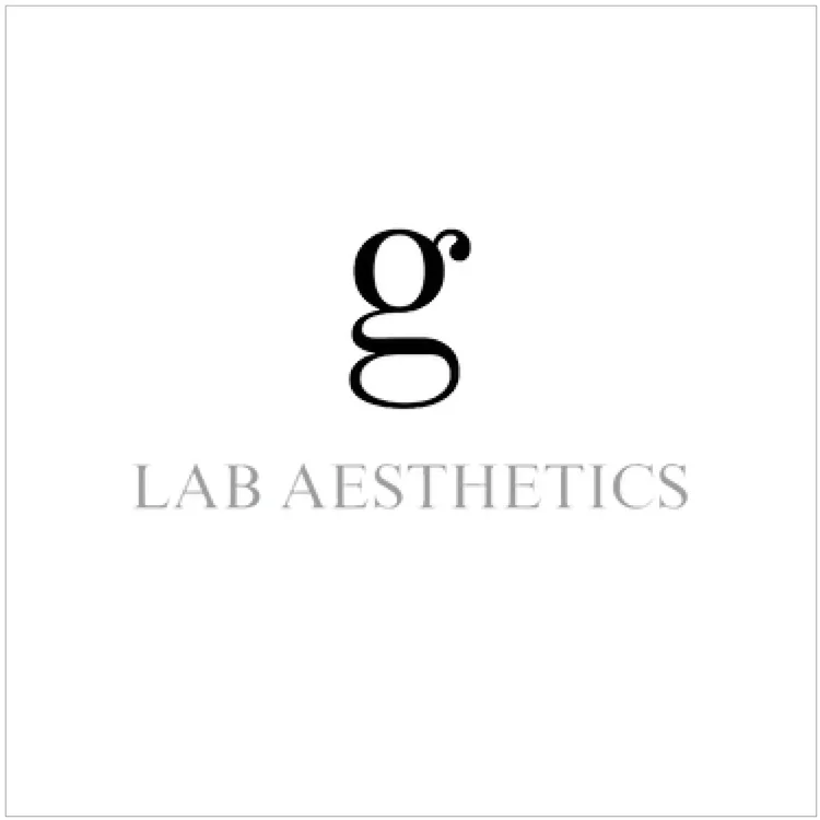 Logo for Lab Aesthetics with a stylized lowercase 'g' and gray text.