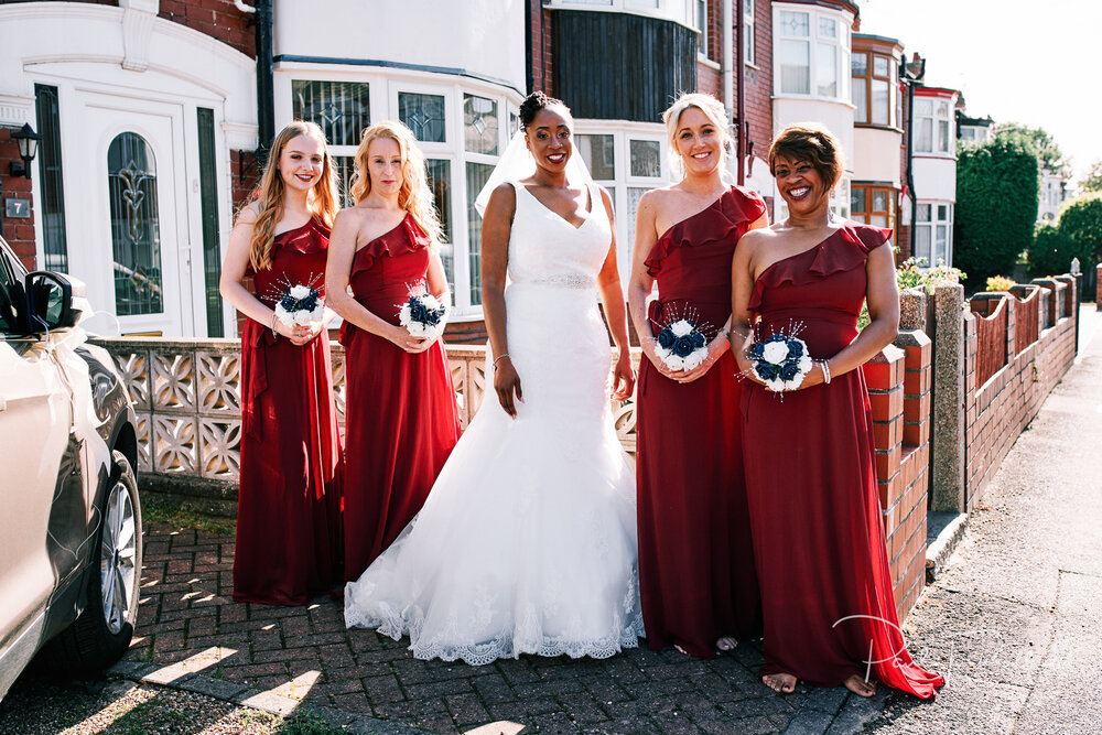 Bride and bridesmaids setting off for the wedding. Wedding Photographer Hull