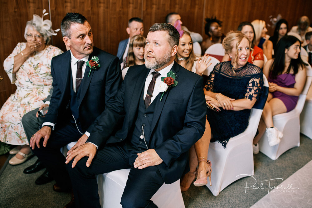 The groom waits patiently for his bride at Lazaat hotel. Wedding photographer Hull