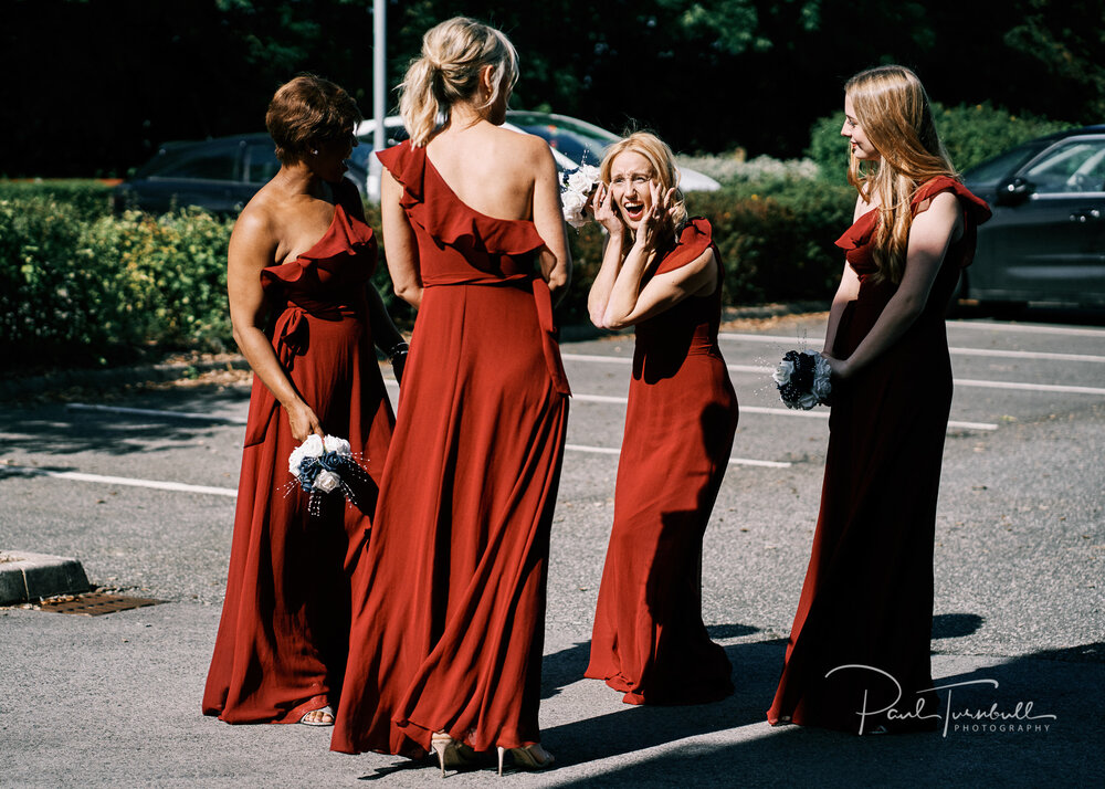 Excited bridesmaids outside Lazaat. Wedding photographer Hull