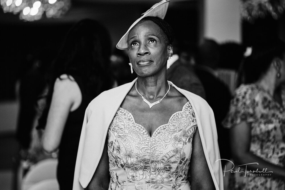 The bride's mother trying to remain calm at Lazaat Hotel. Wedding photographer Hull