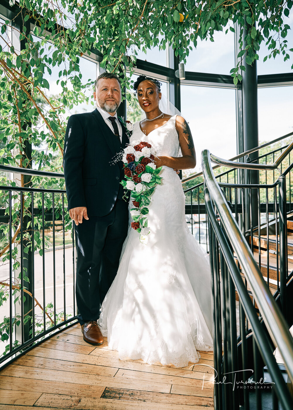 Bride and groom on the staircase at Lazaat Hotel. Bride and groom enjoying the gardens of Lazaat Hotel. Wedding photographer Hull