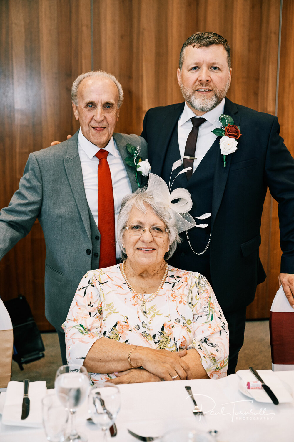 The groom with his parents. Bride and groom enjoying the gardens of Lazaat Hotel. Wedding photographer Hull