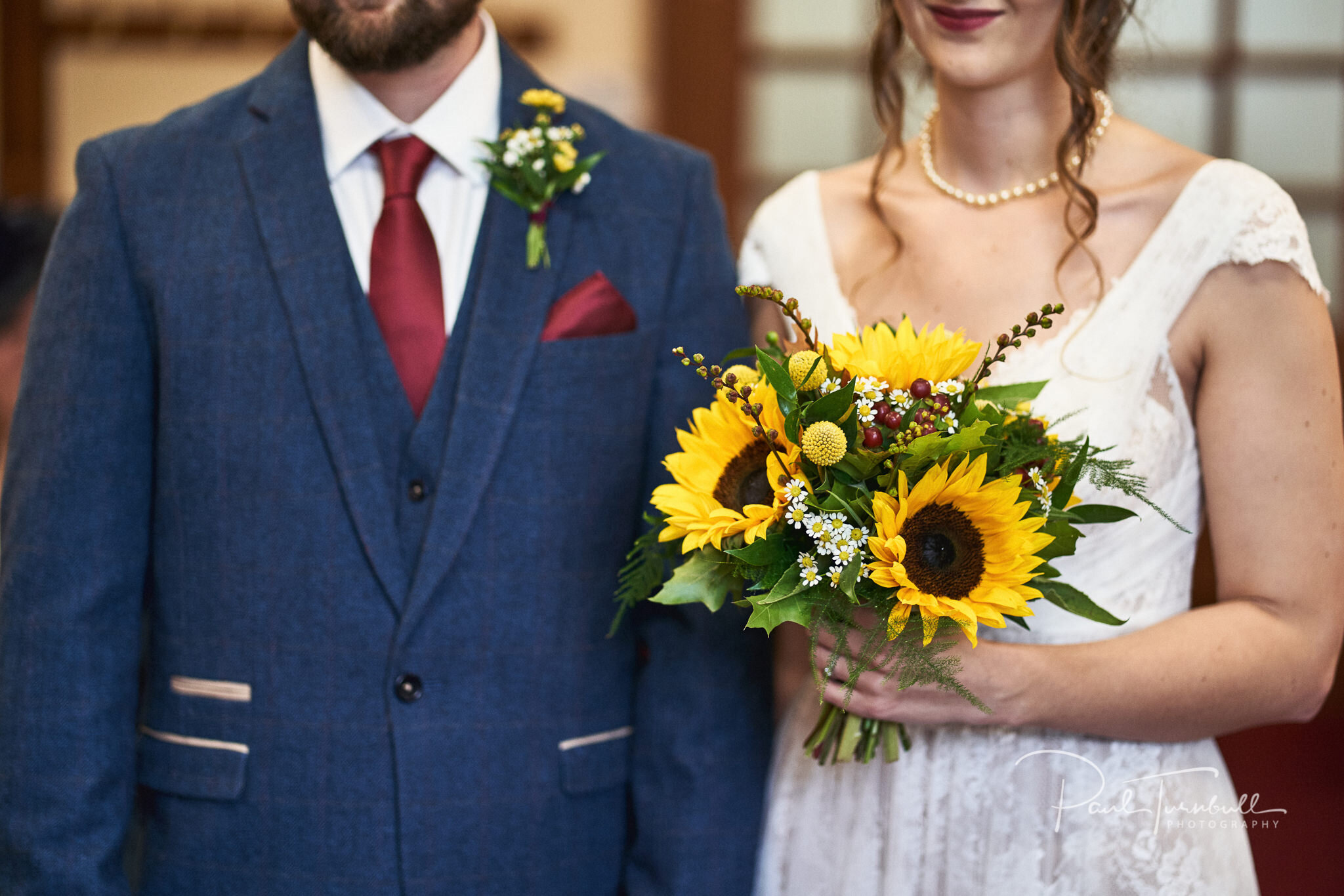 Bride and Groom , Sunflower Bouquet. Wedding Photography at Sheffield Town Hall