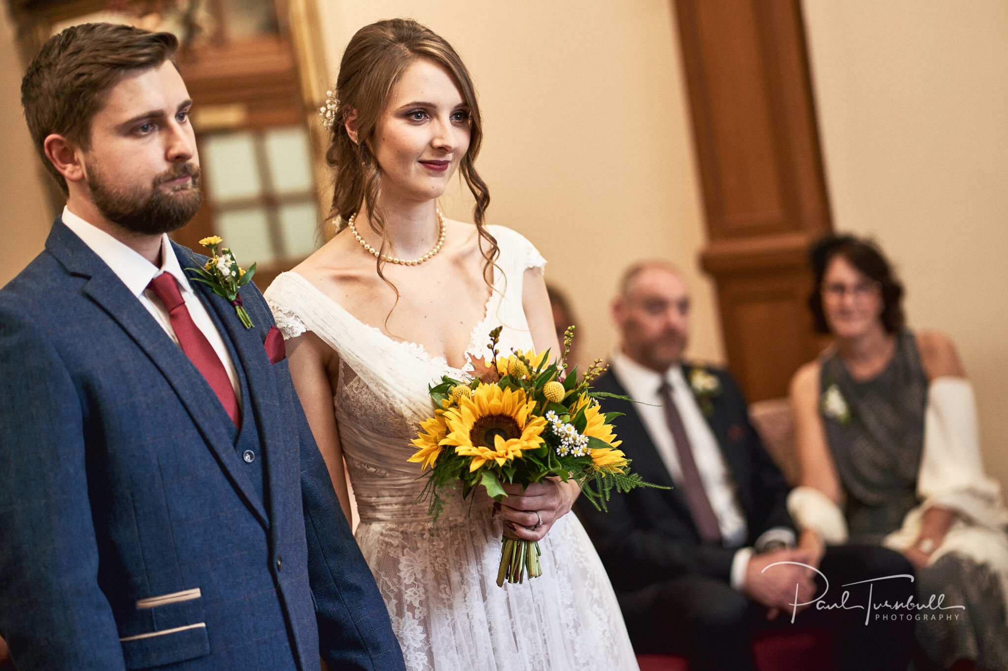 Bride and Groom , Sunflower Bouquet. Wedding Photography at Sheffield Town Hall