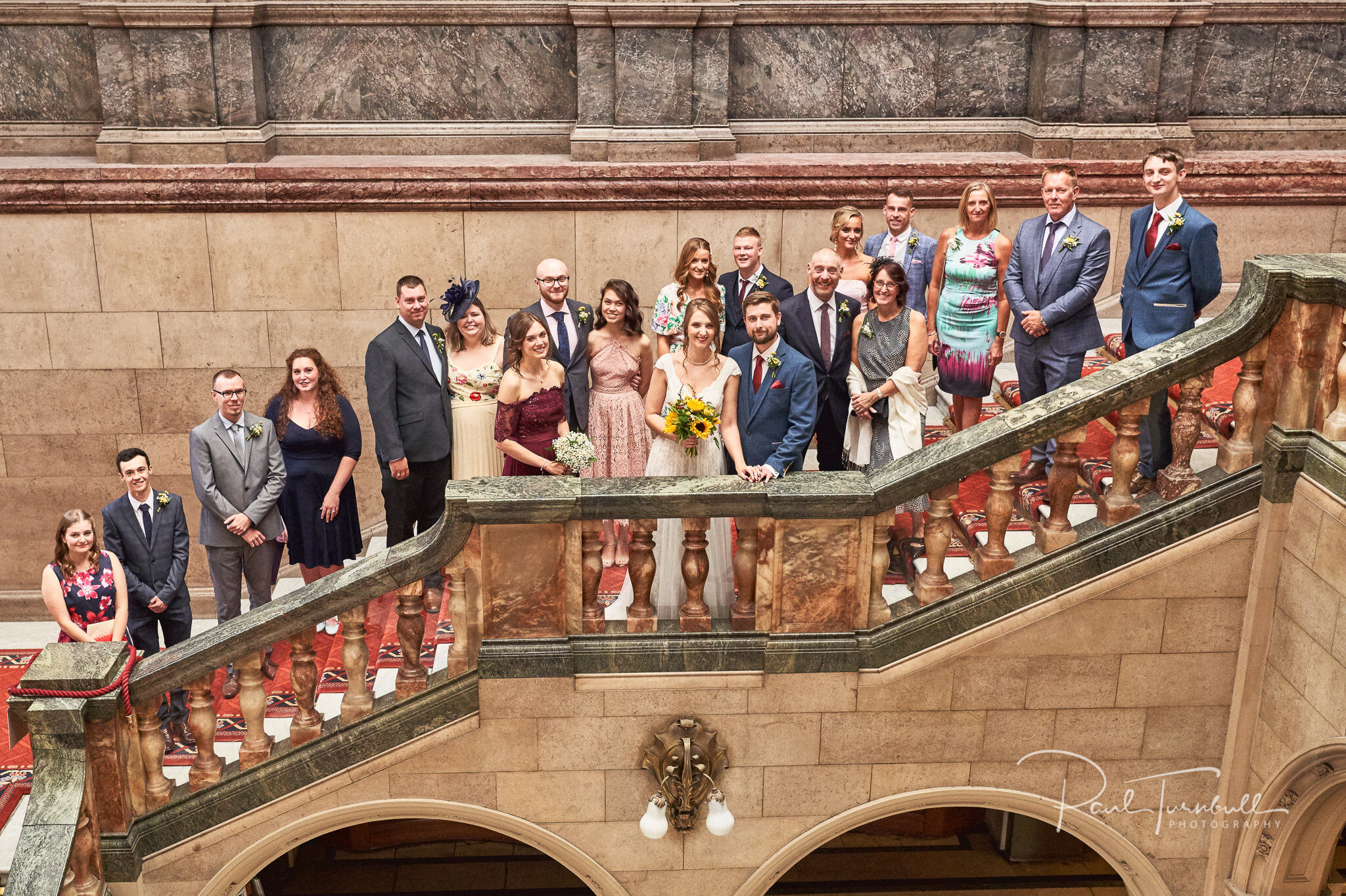 Full Group Shot on the Staircase of Sheffield Town Hall. Wedding Photography at Sheffield Town Hall