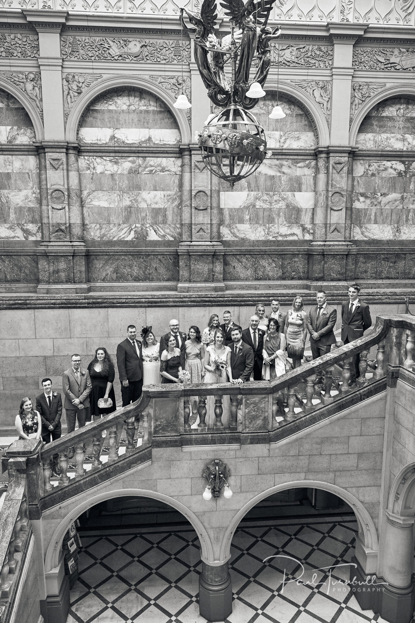 Full Group Shot on the Staircase of Sheffield Town Hall. Wedding Photography at Sheffield Town Hall