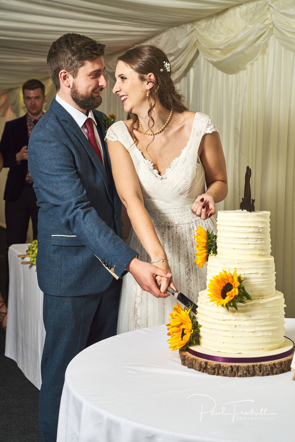 Cutting the Sunflower Wedding Cake. Sheffield Wedding Photography