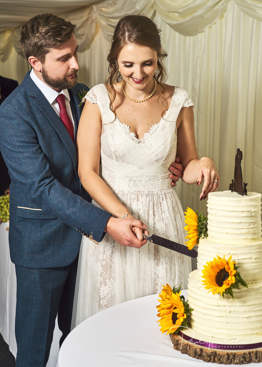 Cutting the Sunflower Wedding Cake. Sheffield Wedding Photography