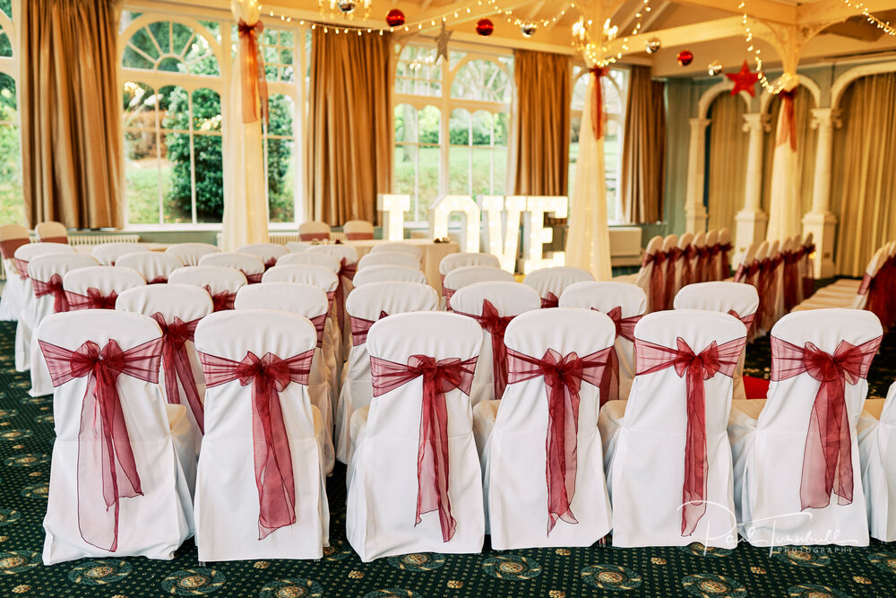 The grand ballroom at The Old Swan Hotel, prepared for Kelly and Dave's wedding ceremony