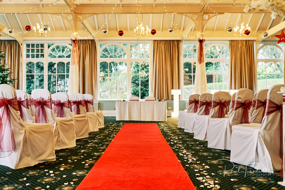 The grand ballroom at The Old Swan Hotel, prepared for Kelly and Dave's wedding ceremony