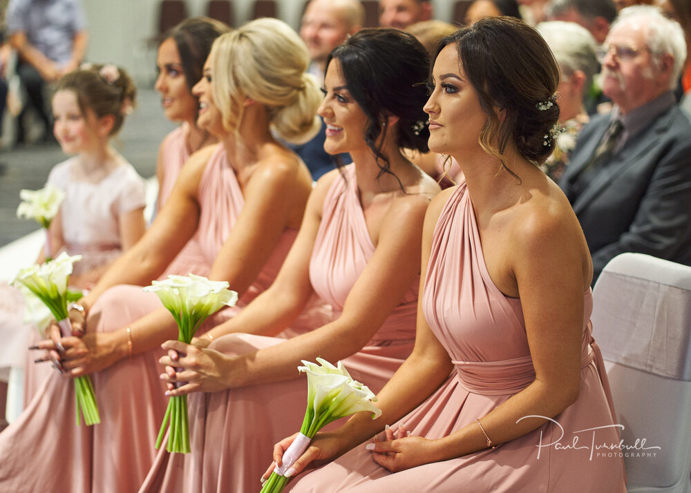 Bridesmaids and Flower Girl Watching Ceremony