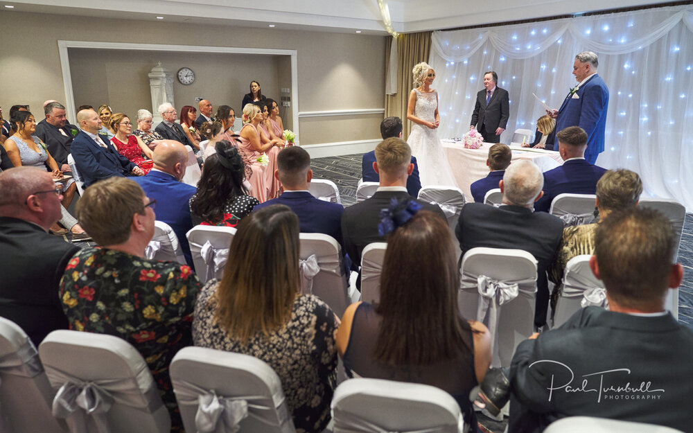 Wedding Guests Watching the Ceremony