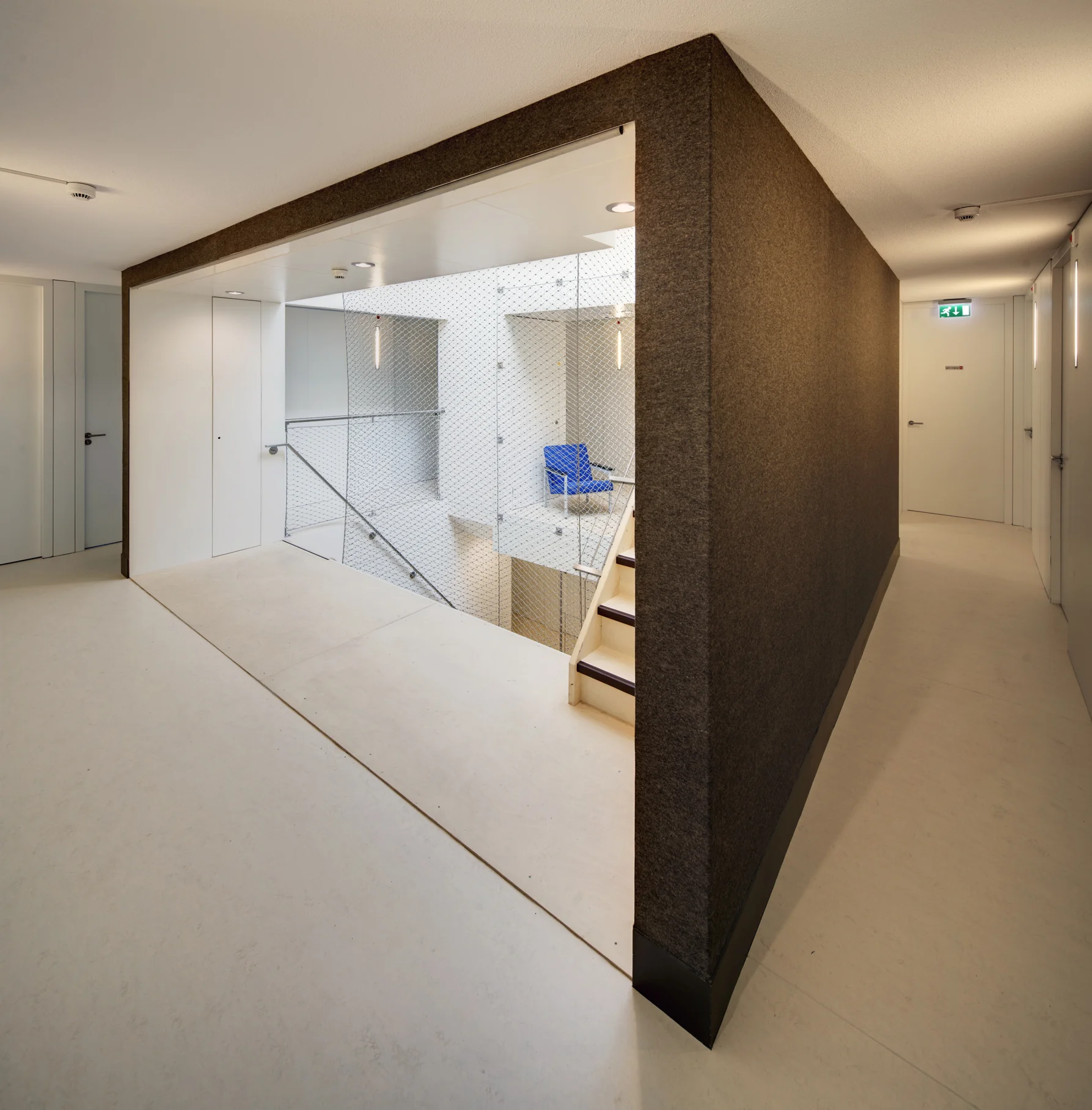 the central element is clad with dark brown felt for acoustic purpose