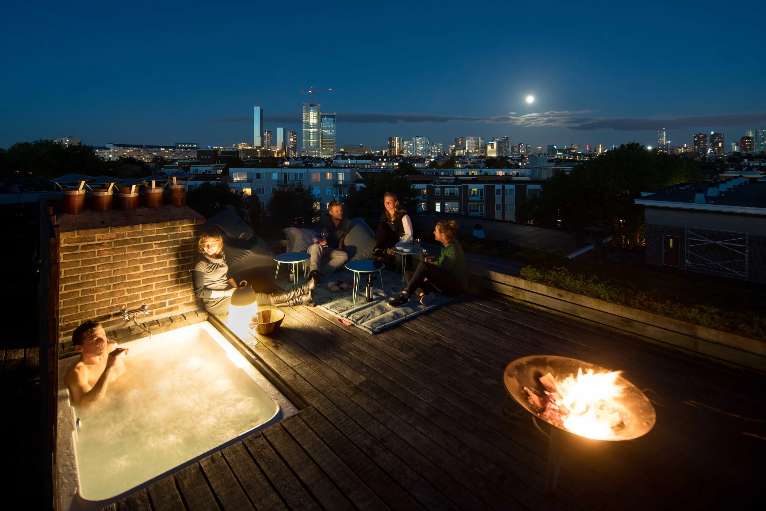 the wooden deck folds open revealing the 'secret jacuzzi'